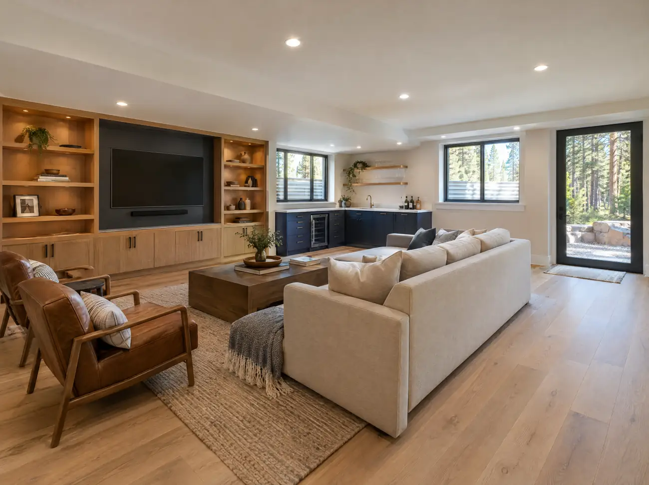 Castle Rock basement finishing: a walkout basement family room with a wet bar