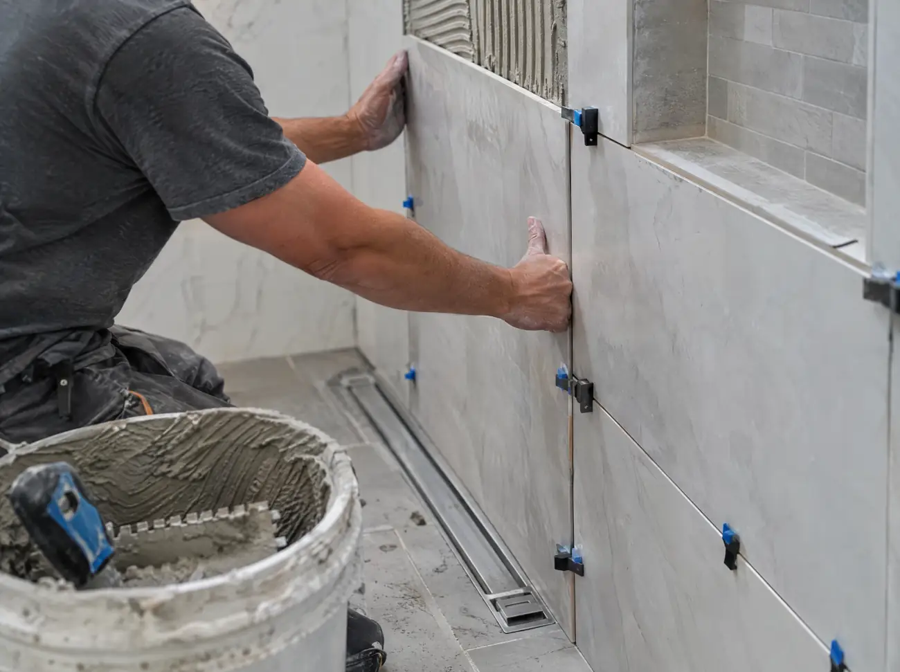 Castle Rock tile: setting large-format porcelain tile in a shower