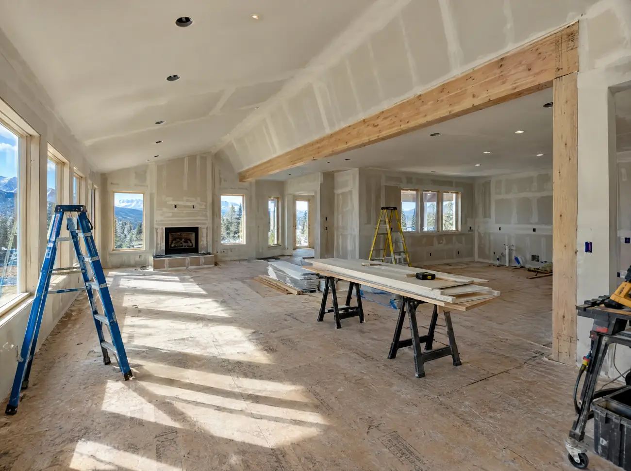 Castle Rock whole-home remodeling: an opened-up great room with a new beam and fresh drywall